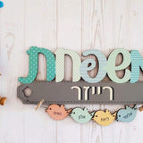 שלט "משפחת" באותיות כתב